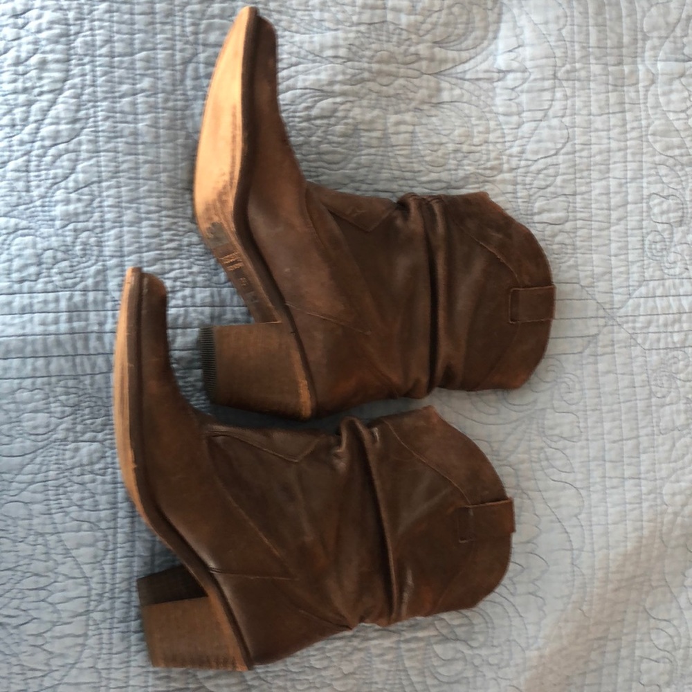 Mustang cowboy boots-made and purchased in Spain.